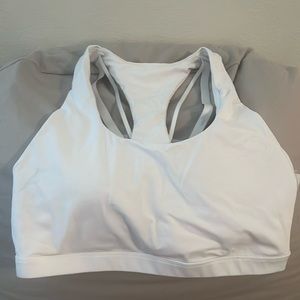 White Fabletics Sports Bra with Black and White Decorative Straps